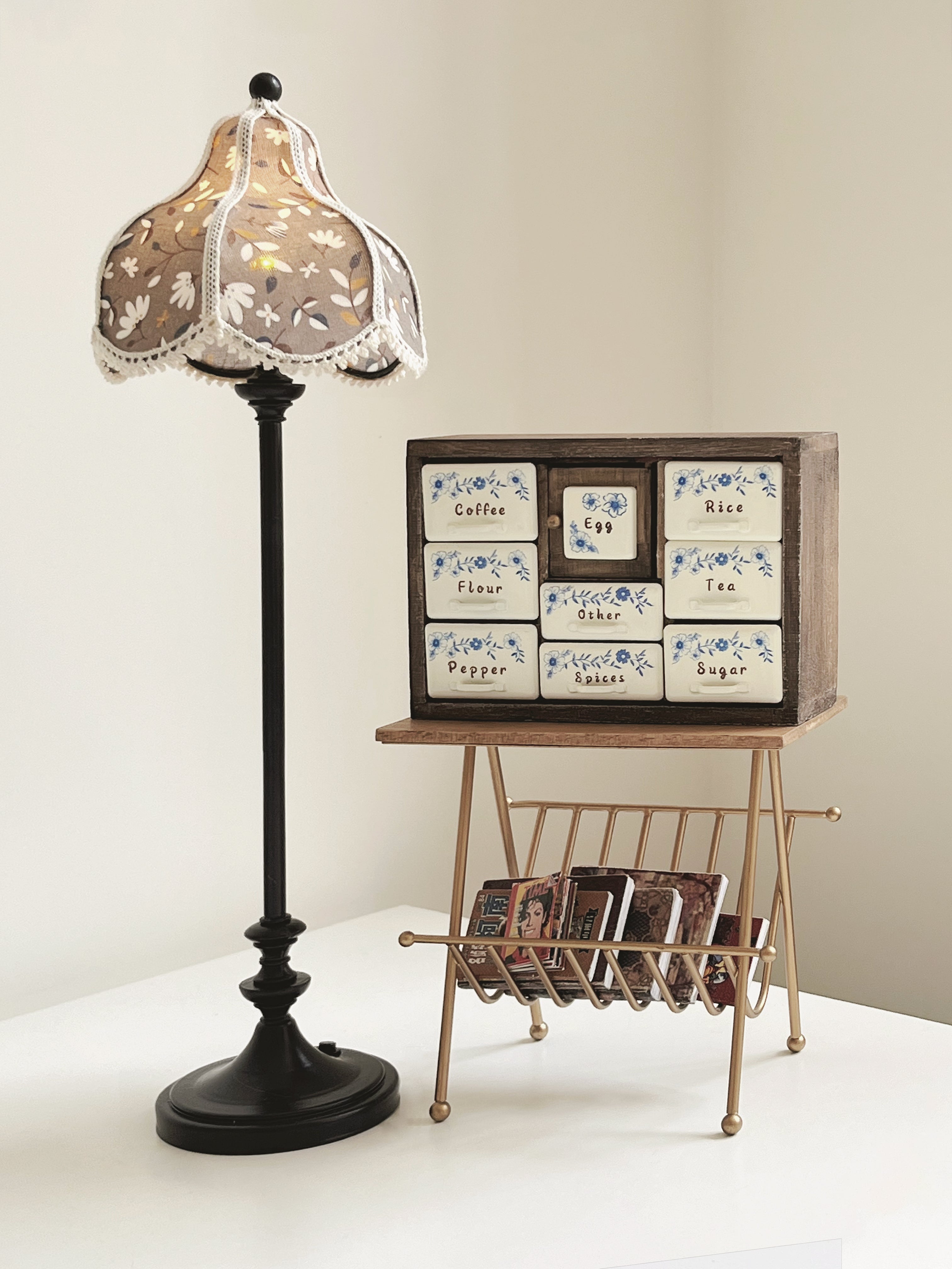 Antler Brown 1:6 spice cabinet styled beside vintage standing lamp and miniature magazine rack