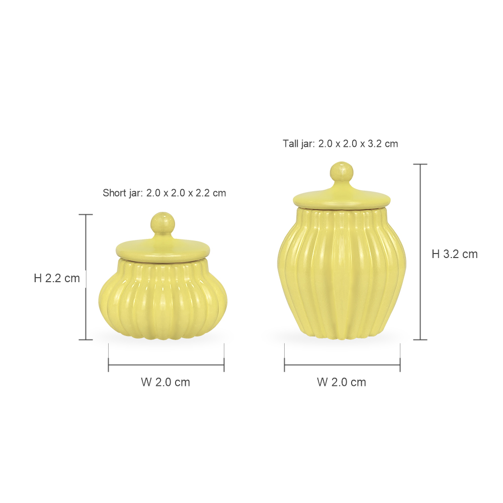 Dimension chart for yellow 2-piece lidded jar set showing short jar 2.0 x 2.0 x 2.2 cm and tall jar 2.0 x 2.0 x 3.2 cm