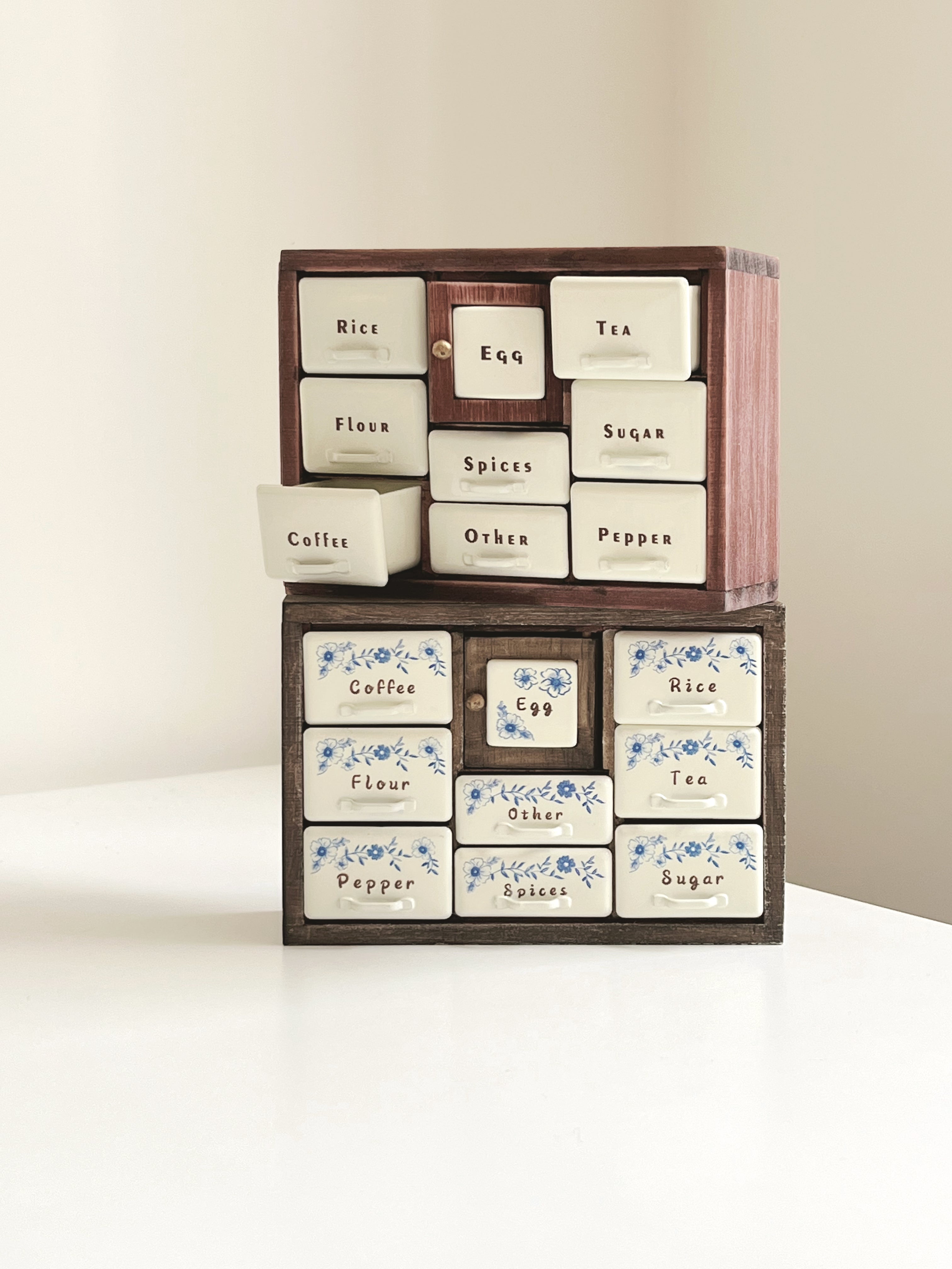 Red Bean spice cabinet with removable drawers in front of dollhouse pantry scene
